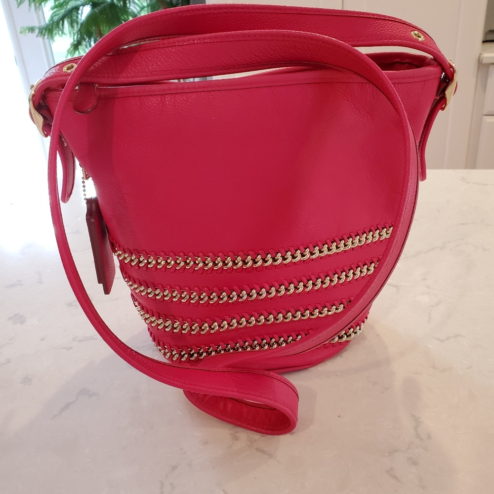 Coach handbag with gold hardware